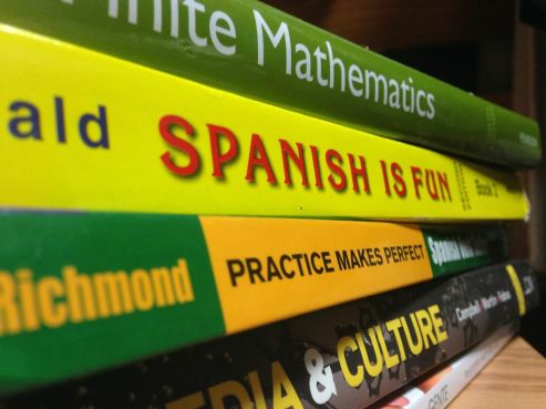 A number of factors affect textbook price, but publishing costs and new editions are two of the primary ones. (Photo by Caitlin Ashley Perniciaro /THE RAM or Courtesy of SITE)