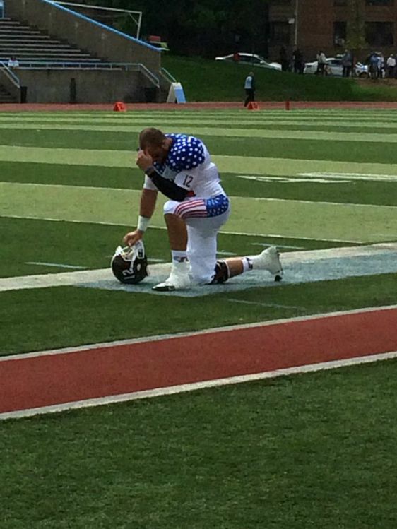 Senior quarterback Mike Nebrich takes a moment prior to his last Liberty Cup game. (Kelly Kultys/The Ram)