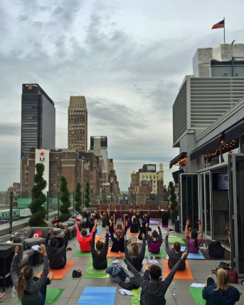Yoga classes can be taken all over the city, including rooftops and gardens. Courtesy of Caroline Lebranti. 