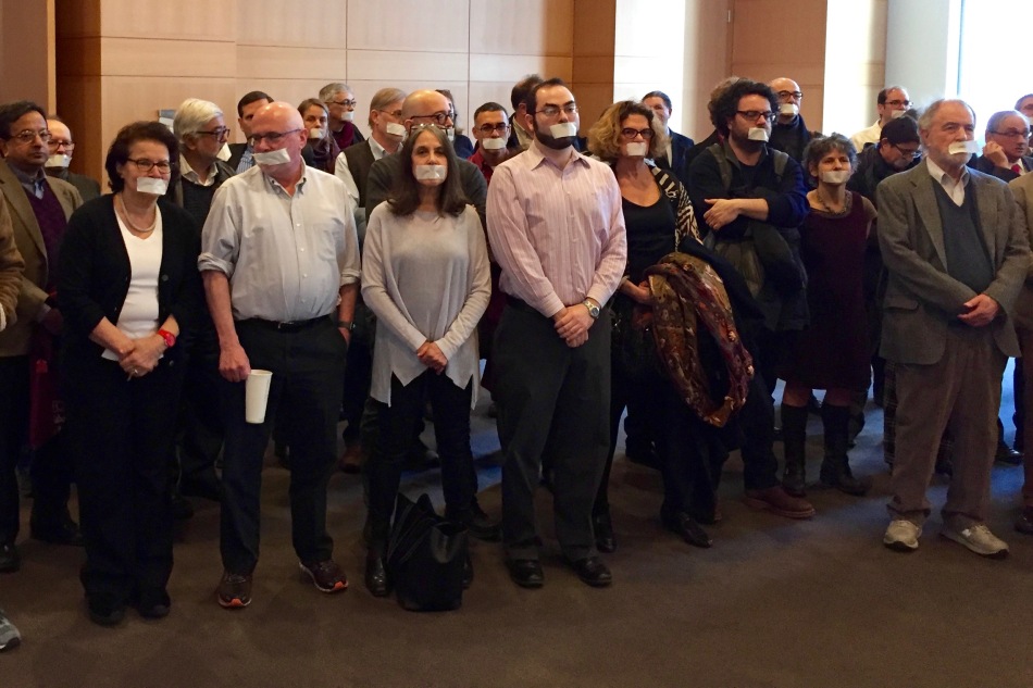 Fordham Faculty Stand in Silent Protest of the Administration